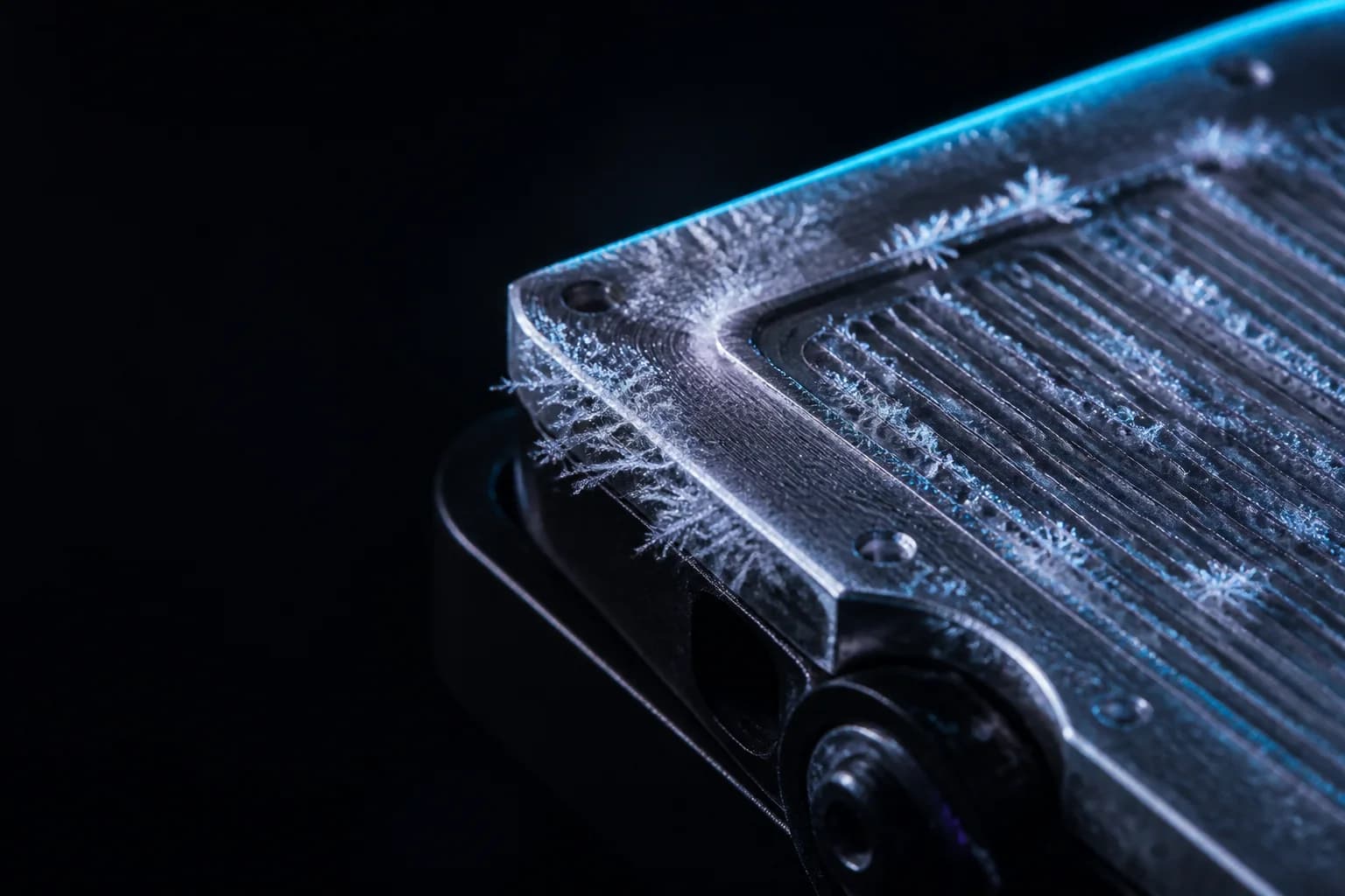 Frost forming across the micro-channels of a machined server cold plate.